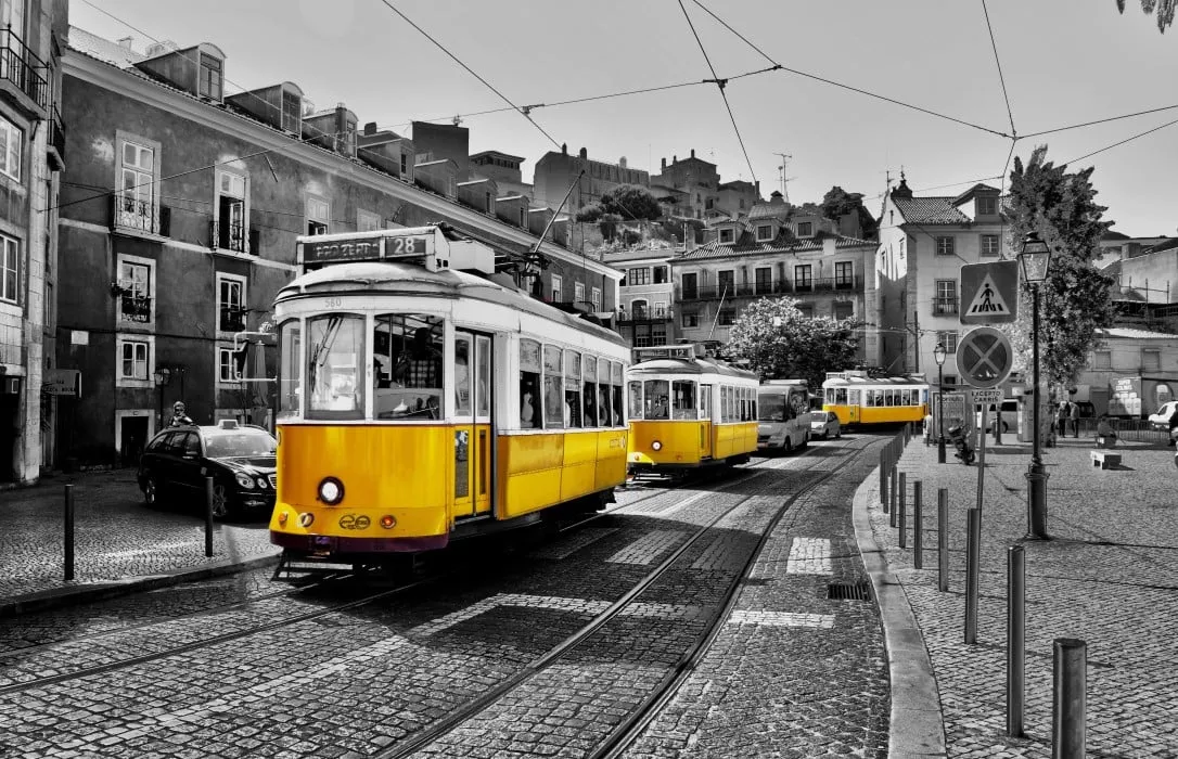 A classic Lisbon tram on a city street